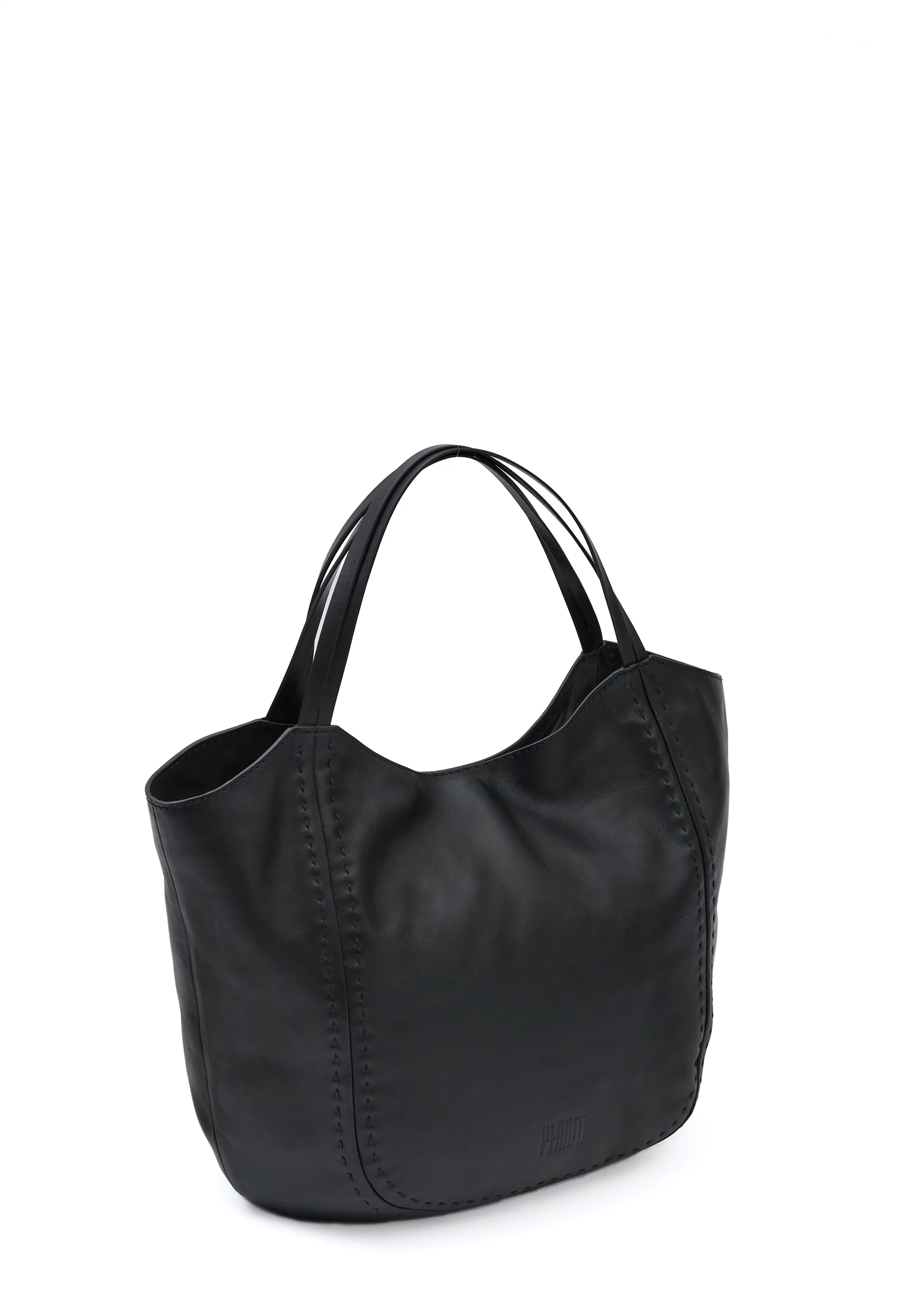 Side view of the Philini Charlotte Tote Bag in Black aniline calf leather, featuring two double flat leather handles, magnetic button closure, and subtle hand-stitched accents. .A premium leather piece that has minimalist design.