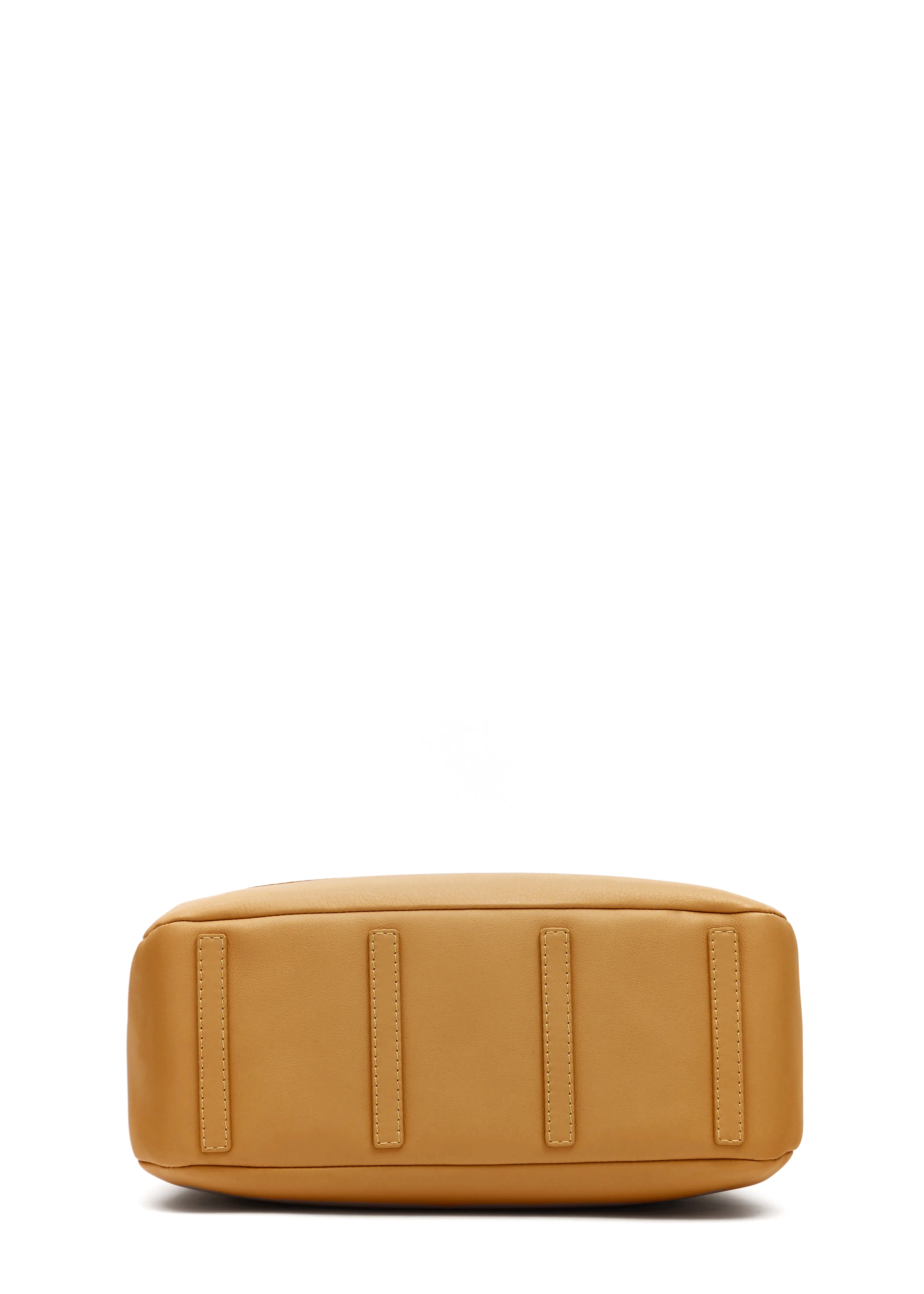 Bottom view of the Philini Domi Handbag in yellow nappa leather, showing dome shape and leather protective feet. Handmade luxury bag with classic style and eco-friendly craftsmanship.