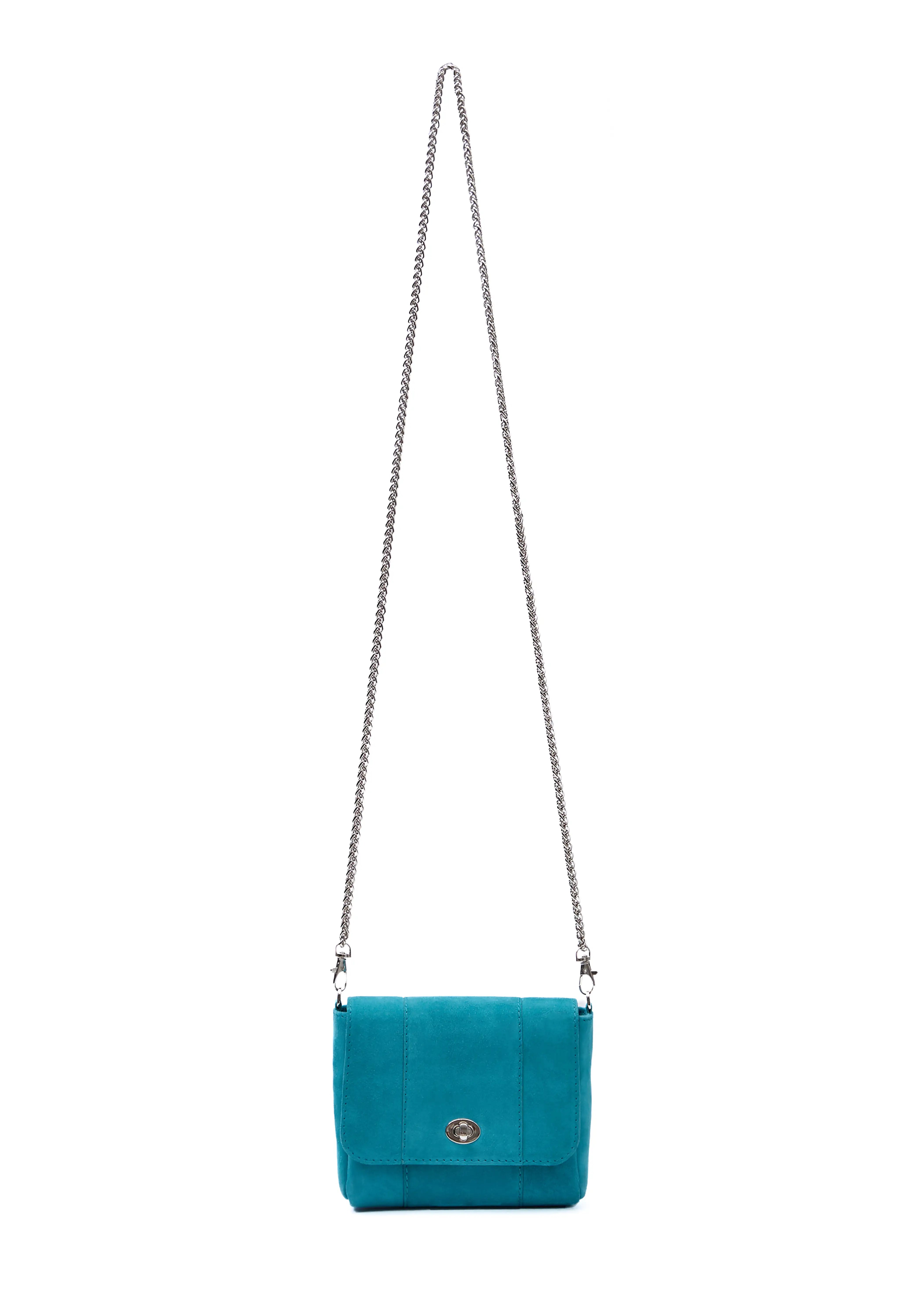 Front view of the Philini Marina Mini Crossbody Bag in turquoise suede leather, rectangular shape with front flap, silver clasp, and silver chain shoulder strap. Chic mini suede bag with a soft finish