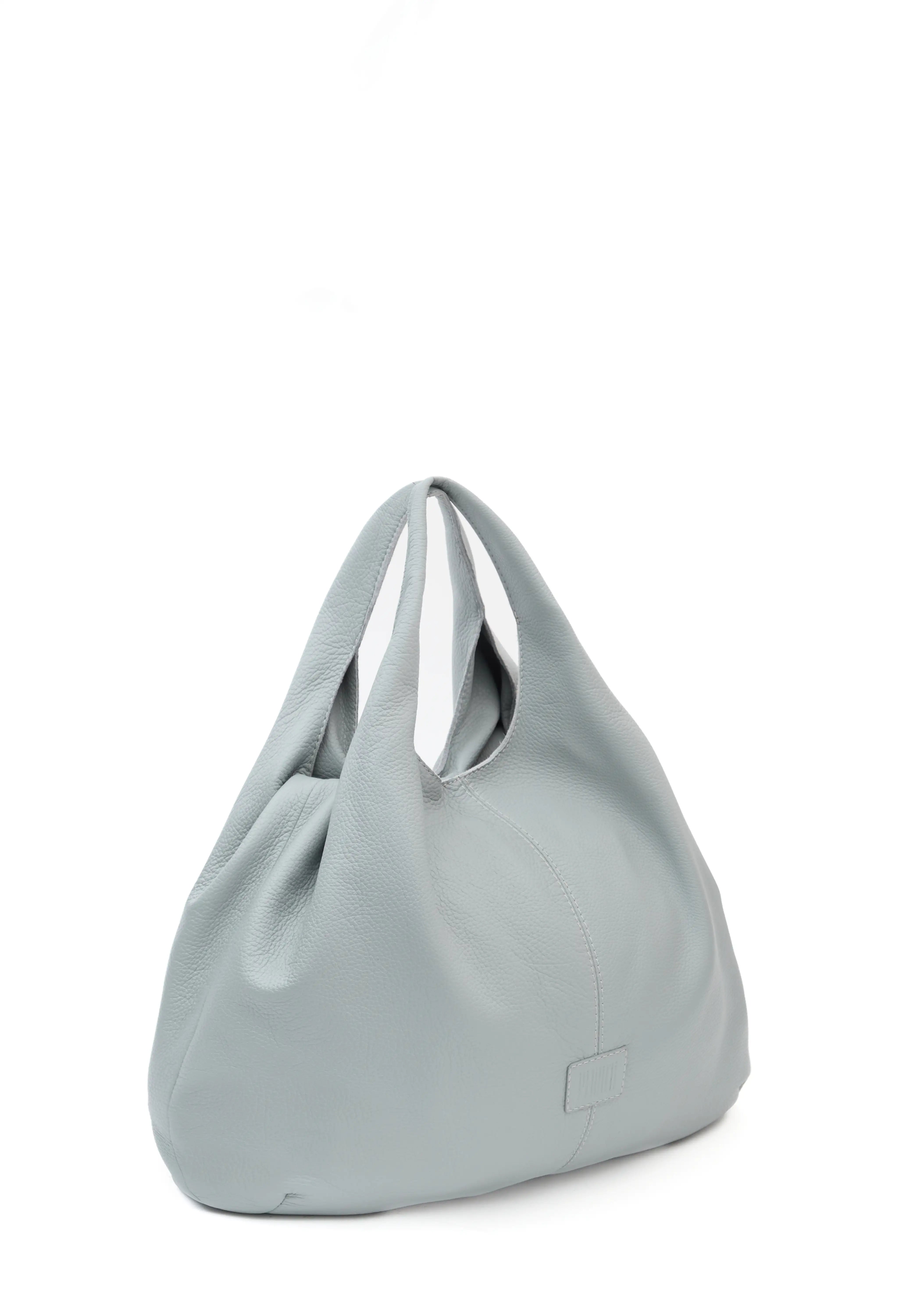 Slightly side view of the Philini Melanie Hobo Bag in grey buffalo leather, showing two top handles, soft textured sides, and a stamped logo. High-quality slouchy leather handbag