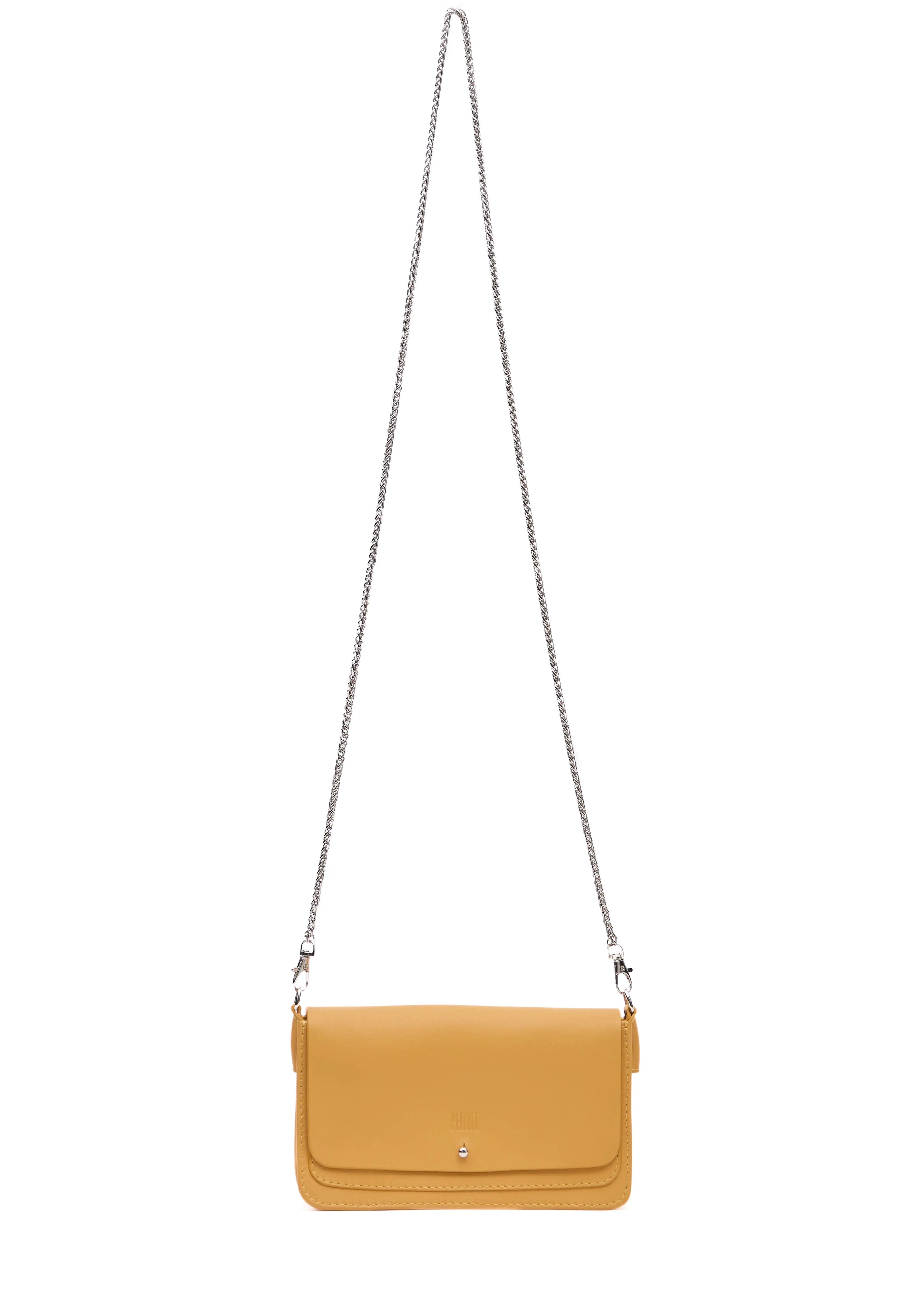 Front view of the Philini Mihaela Wallet Bag in yellow nappa leather, featuring a rectangular design, front flap with silver cufflink closure, and a long metal chain handle. This elegant wallet bag is a sleek, designer ladies accessory.