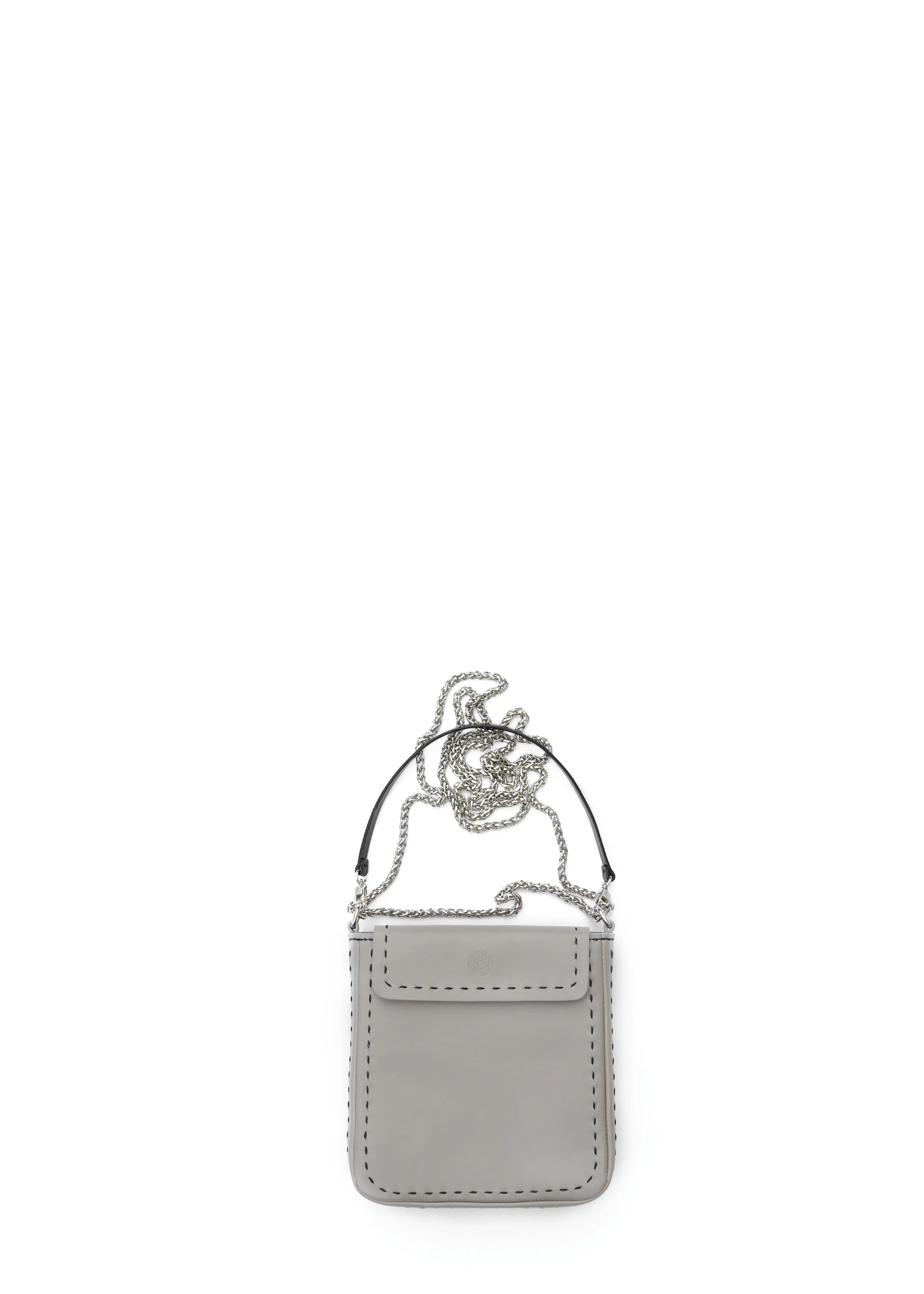 Close front view of the Philini Saphira Purse in taupe aniline leather, compact rectangular shape with hand-stitched details, sleek half-lap flap, and convertible chain and leather straps. Elegant handmade leather evening purse.