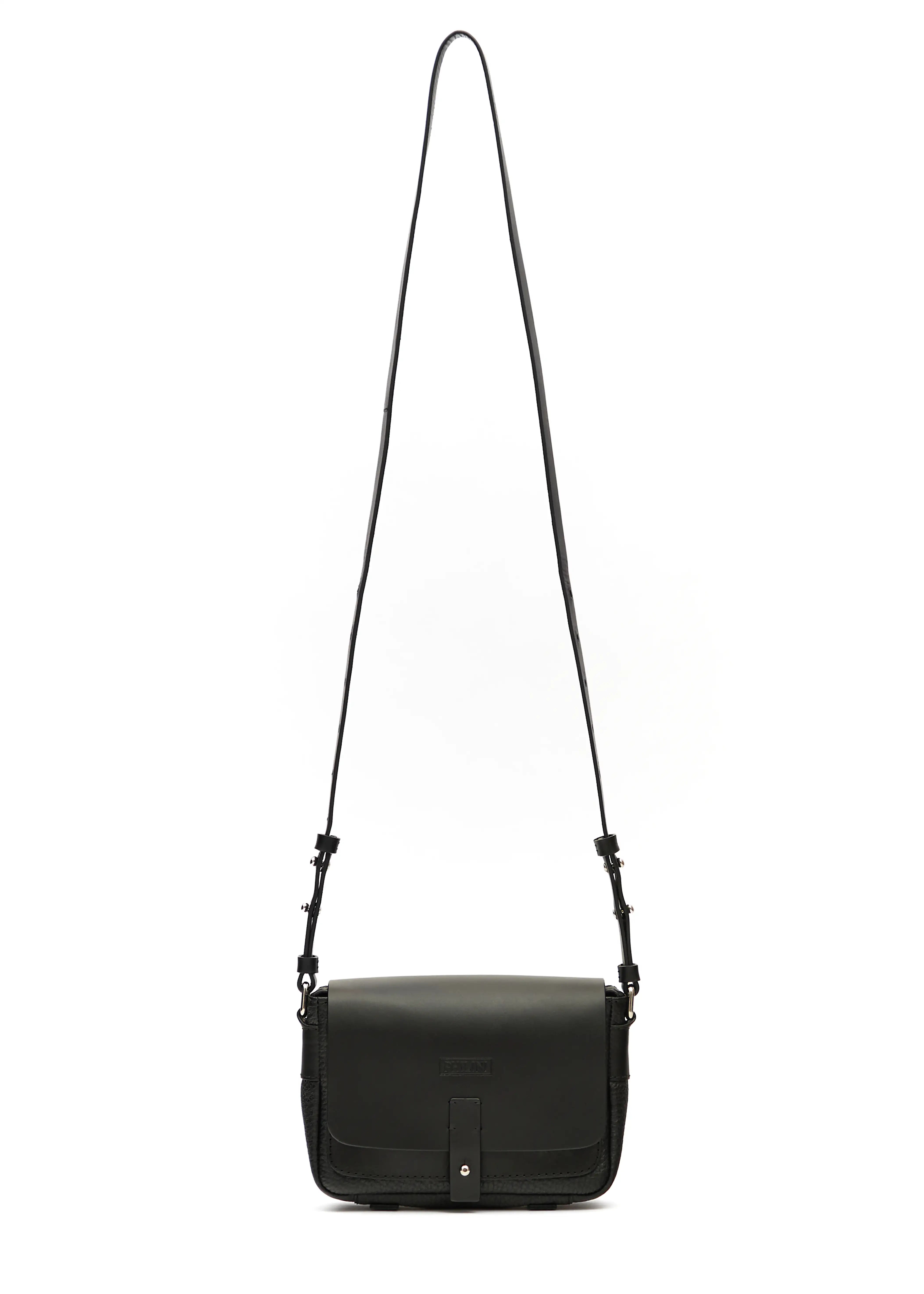  Front view of the Philini Whitney Black Leather Bag, a handcrafted designer bag with a rectangular shape, premium full-grain leather flap, silver push-button closure, and an adjustable strap with silver accents. German-designed and sustainable.